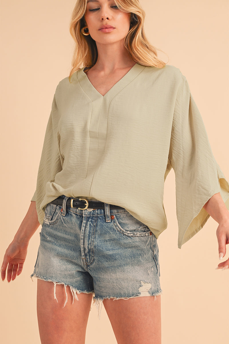 Parchment Solid Color Crinkled V Neck Ruffled Sleeve Blouse