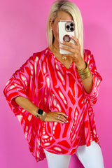 Red Abstract Print V Neck Batwing Sleeve Oversized Blouse