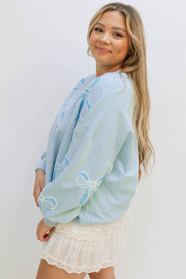 Beau Blue Sequin Bow Drop Shoulder Oversized Sweatshirt