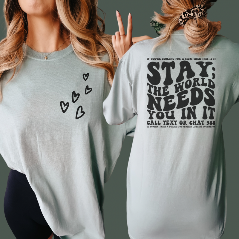 Stay, the world need you in it tee